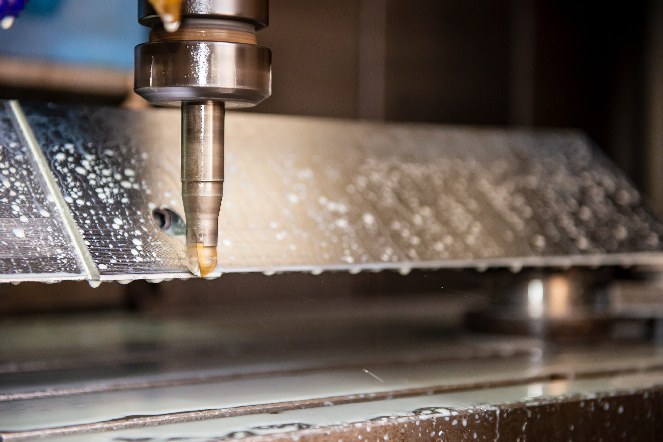 The CNC milling machine rough cutting  the injection mold parts